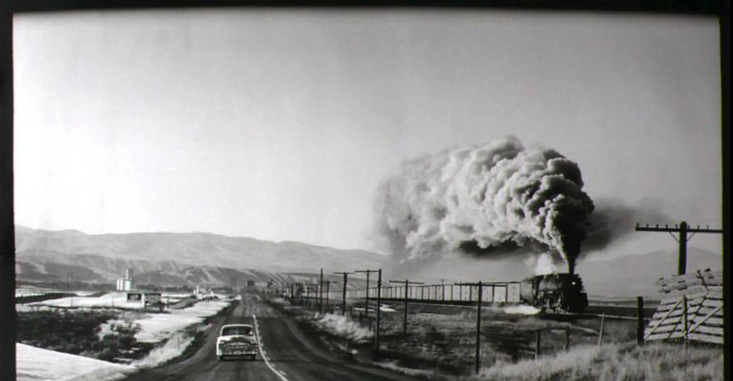 Elliott Erwitt, Steam Train Press, Wyoming, 1954