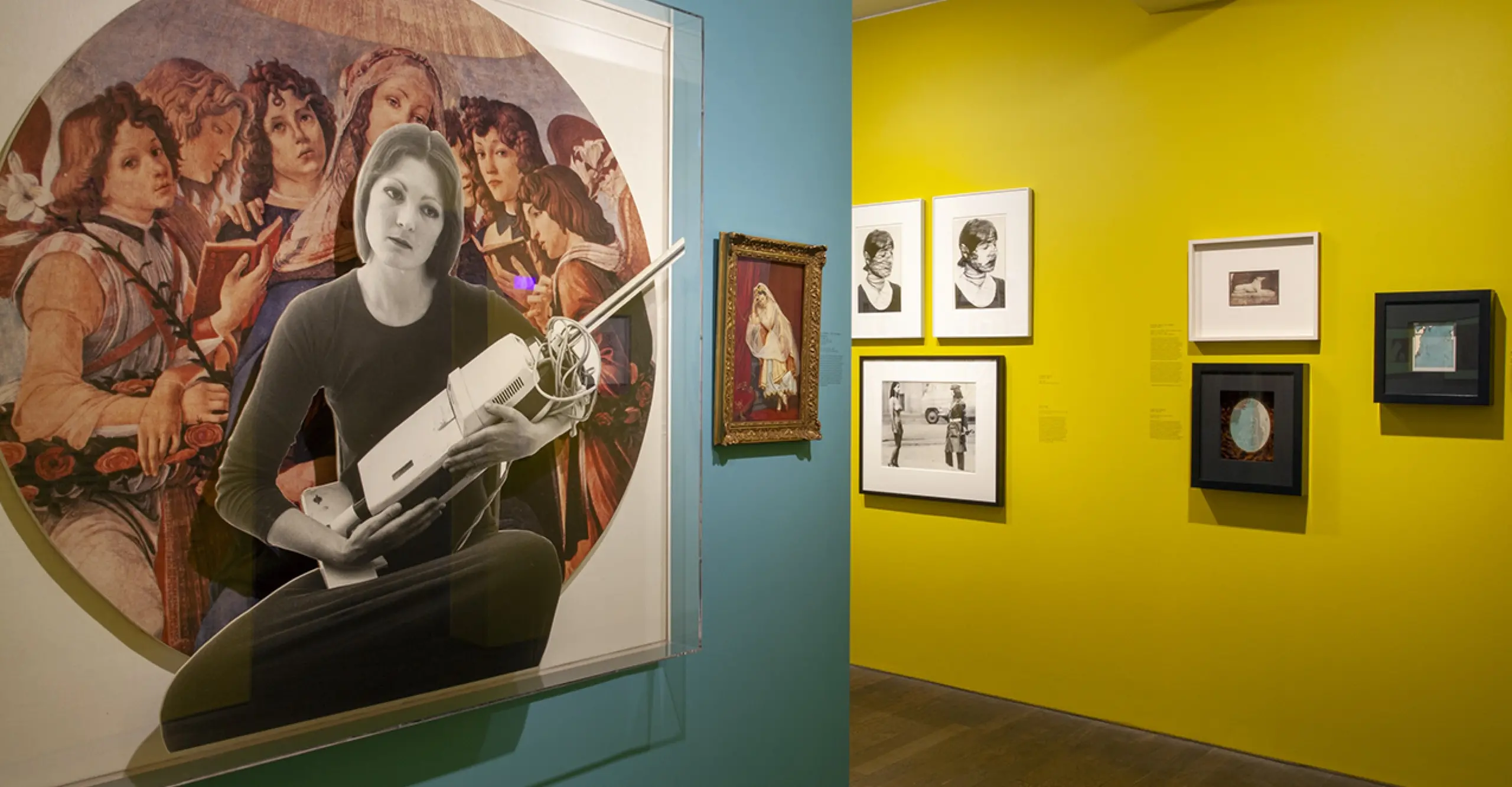 Installation view of Alternative History exh featuring blue and yellow walls 