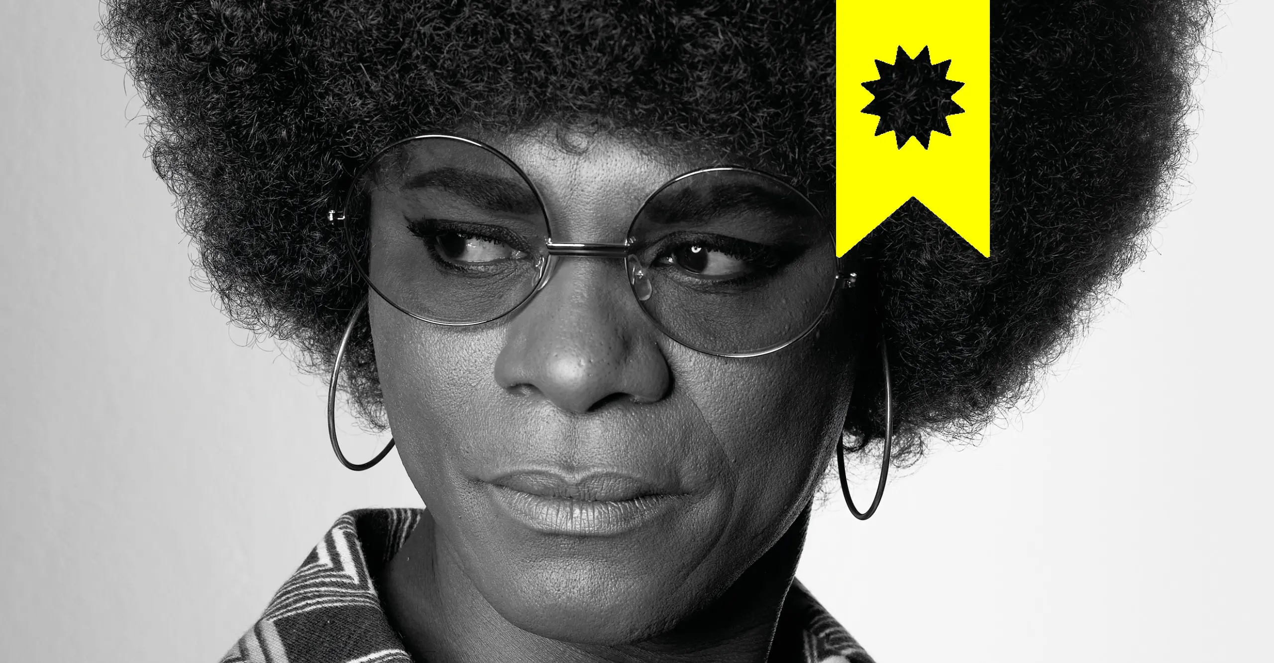 Black & white image of samuel fosso dressed up as American activist Angela Davis