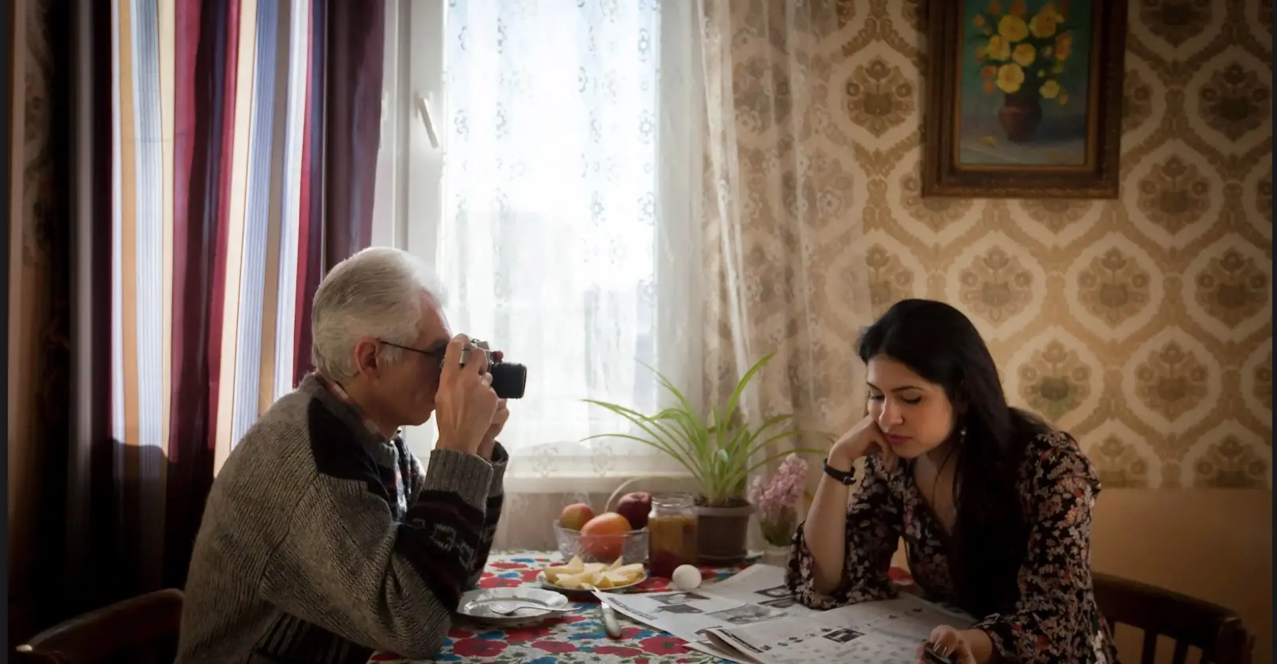 Interior photograph of the artist (on the right) and her father (left)