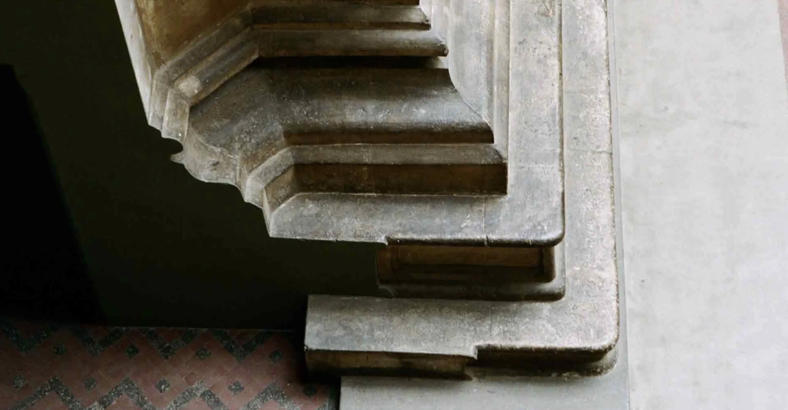 Detail of a colour photograph of a pedestal of a neoclassical column