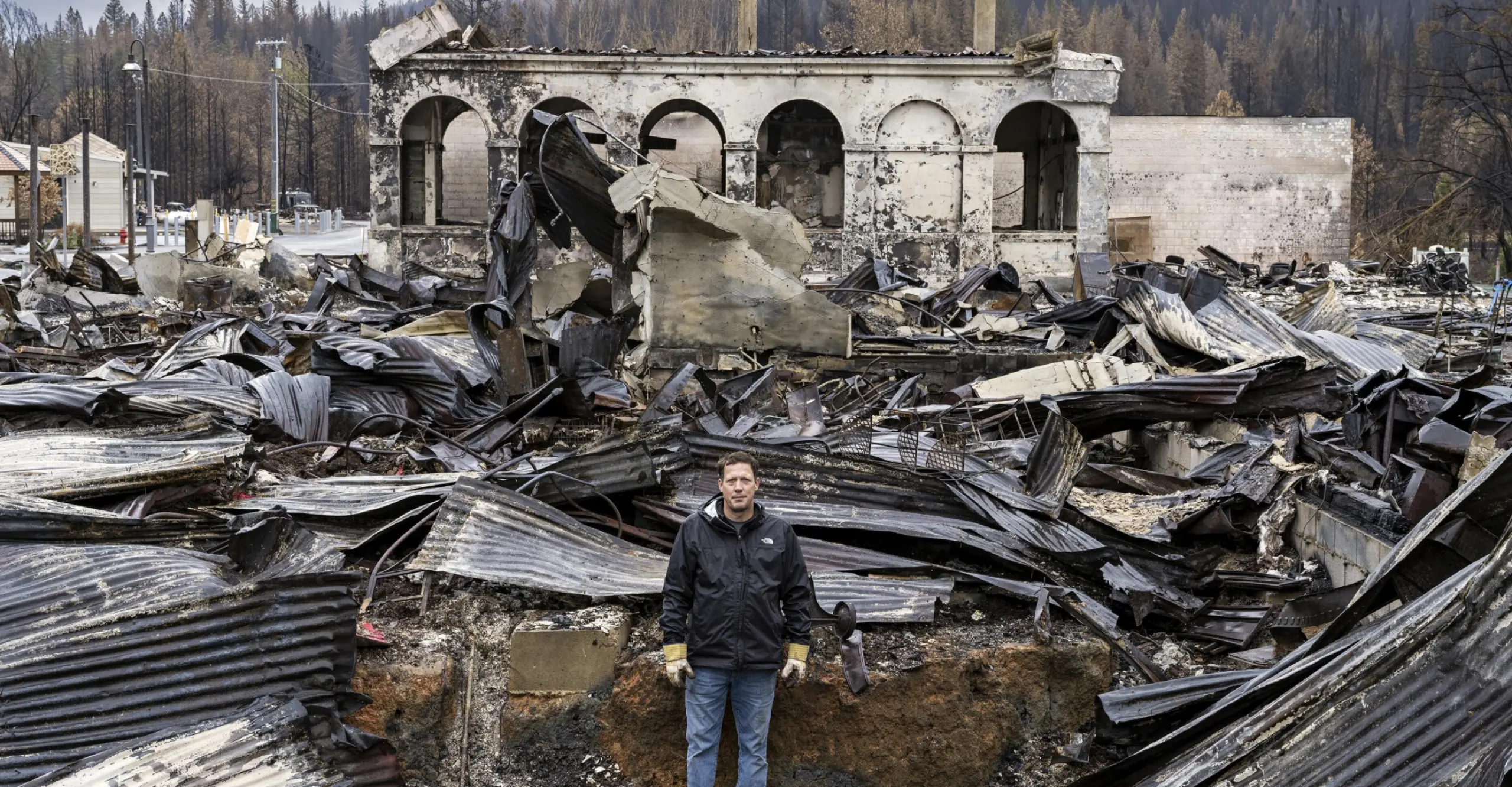 Person standing in debris